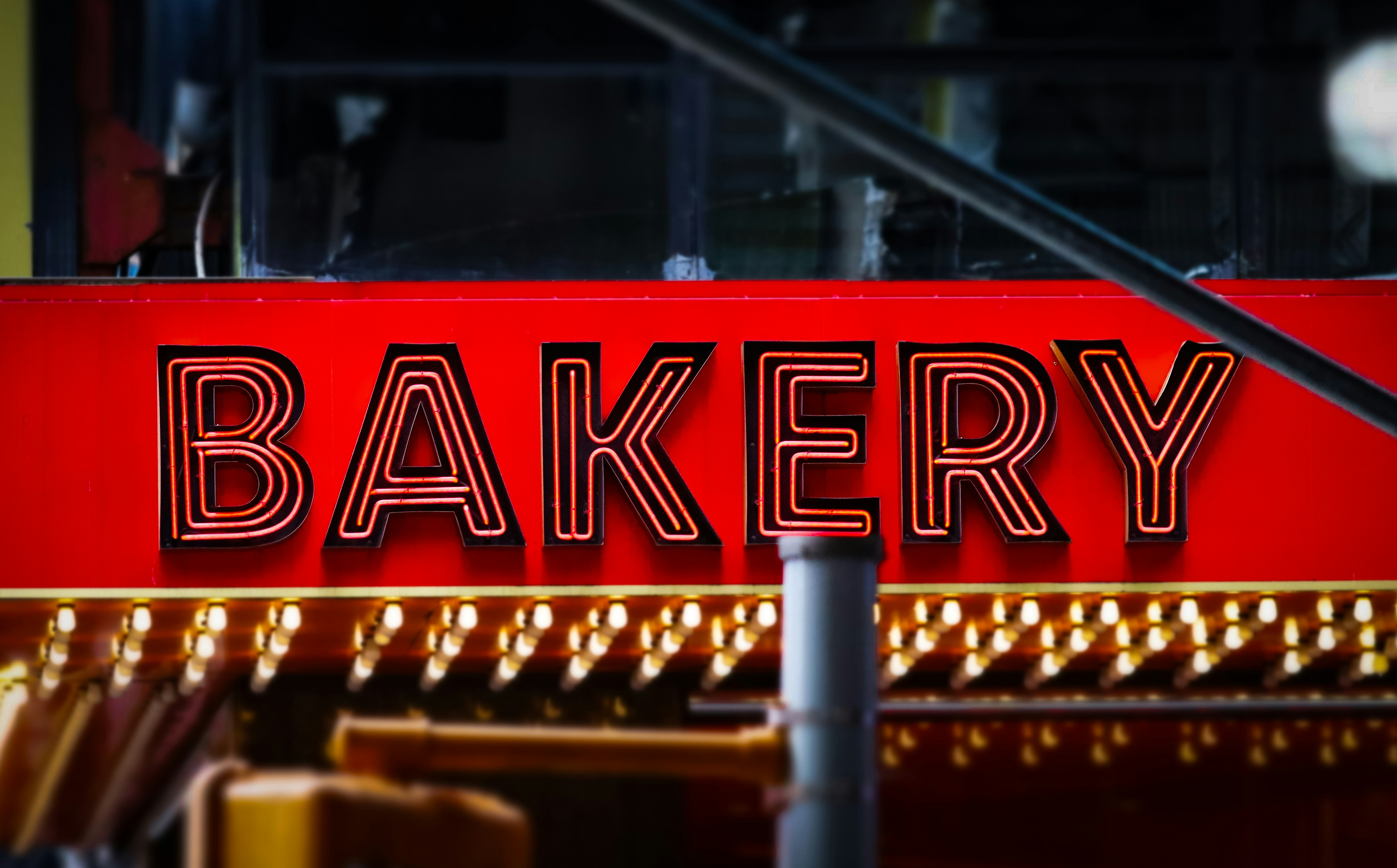 Red neon bakery sign