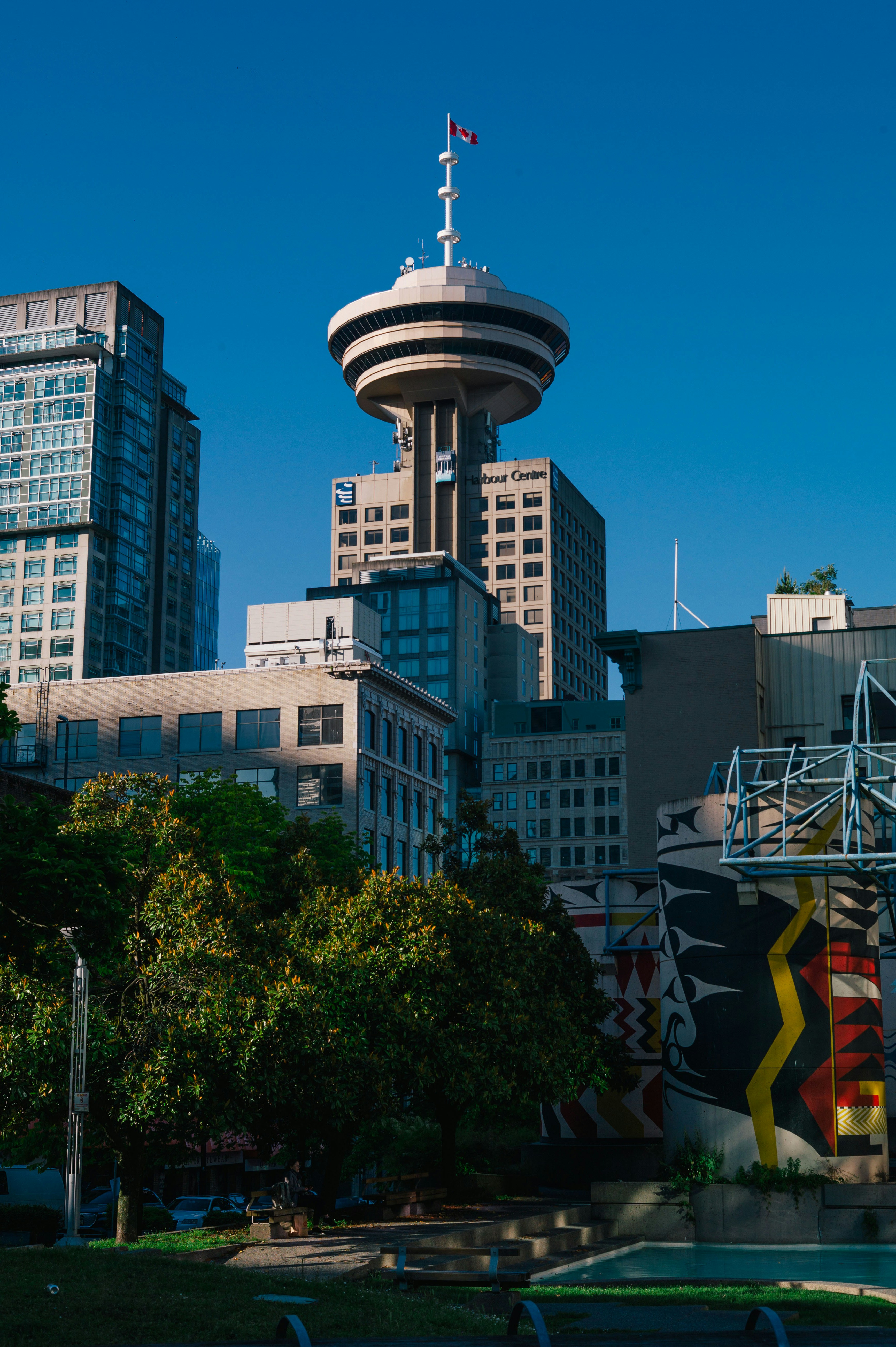 Modern cityscape with a prominent observation tower.