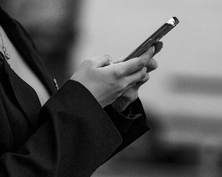 Person using a smartphone with both hands