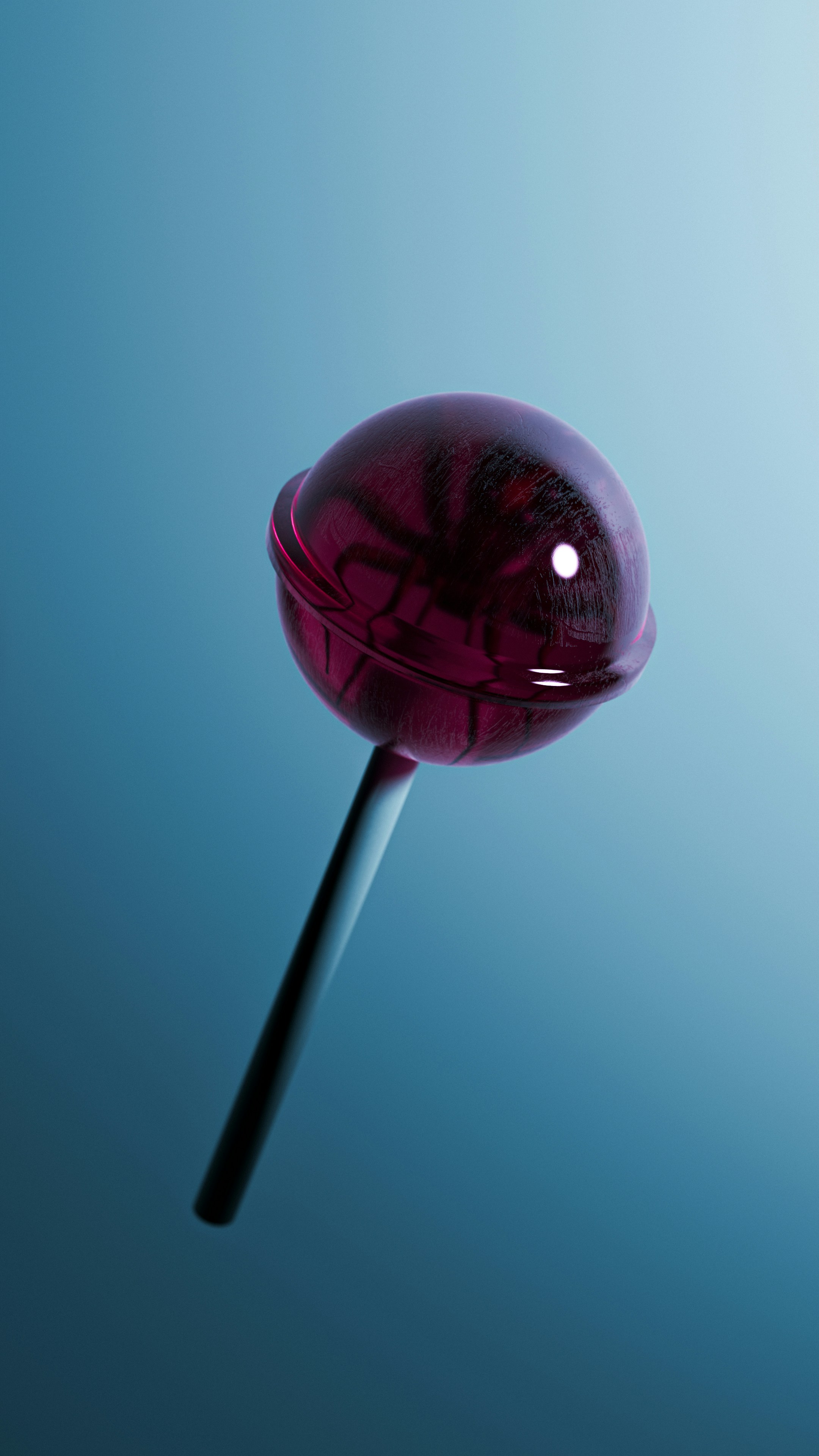 A single red lollipop on a blue background
