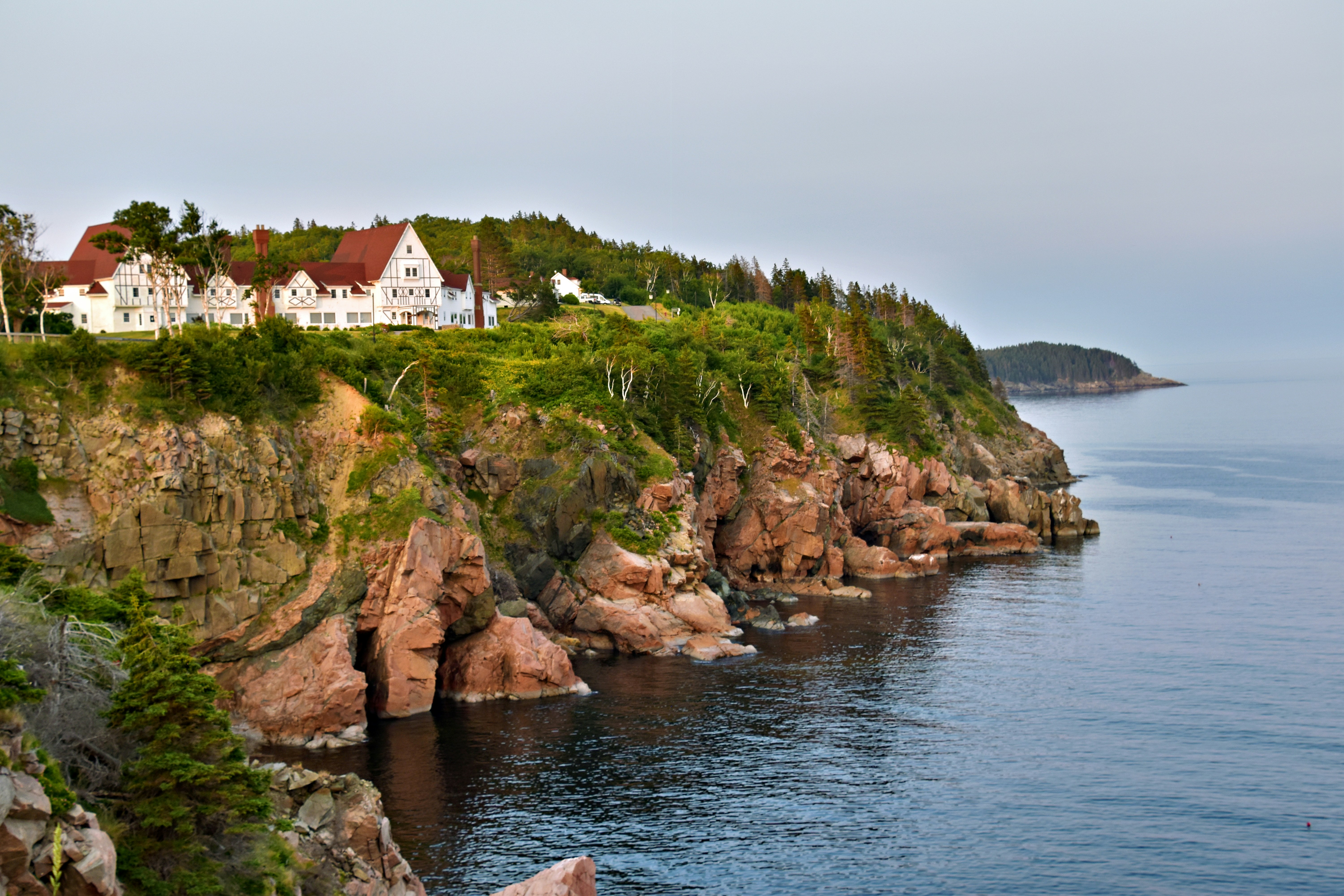 Coastal cliffs with houses overlooking the ocean