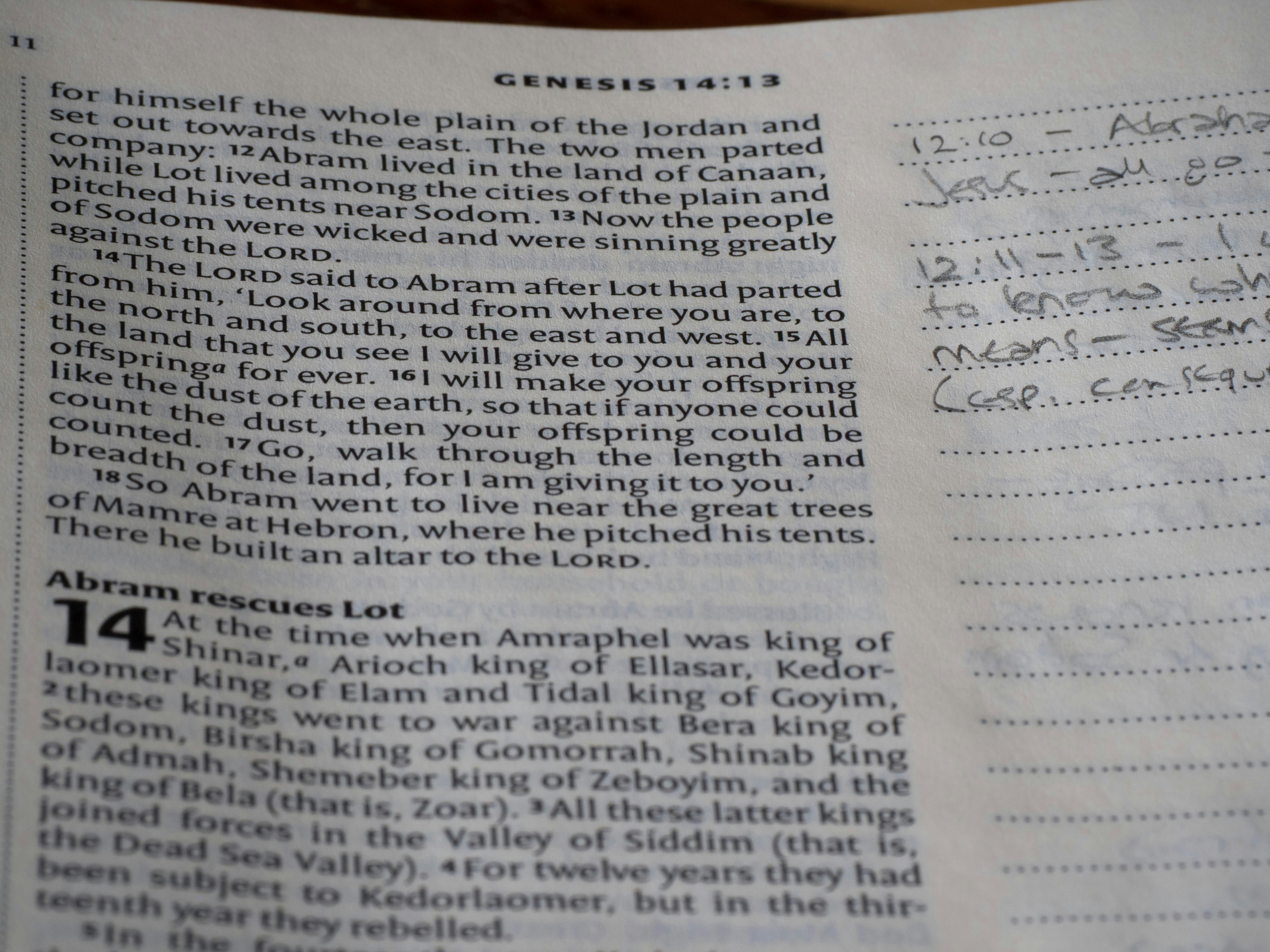 Open bible with handwritten notes beside text. (Photo by Brett Jordan on Unsplash)