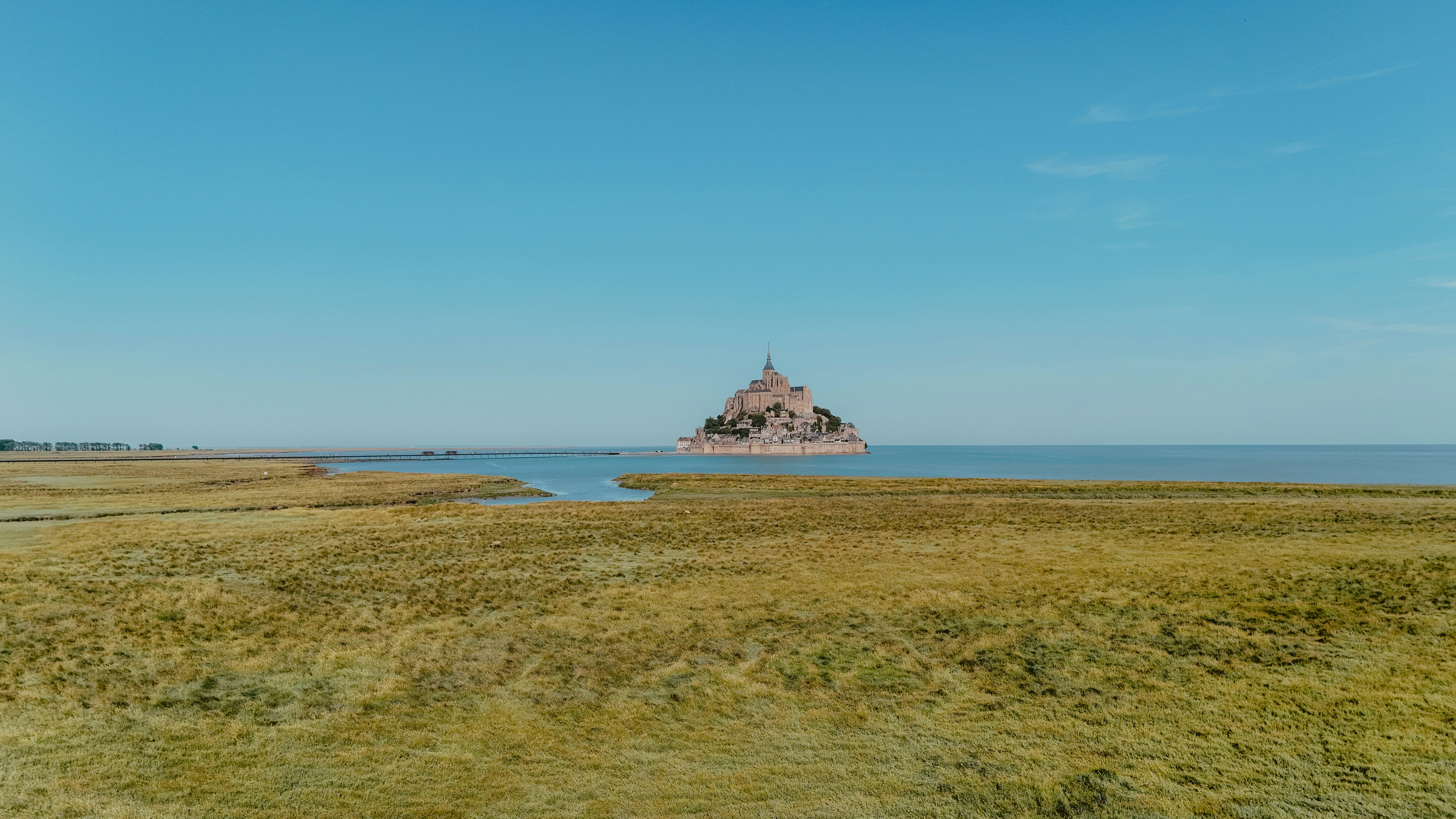 Island abbey on the sea under clear sky