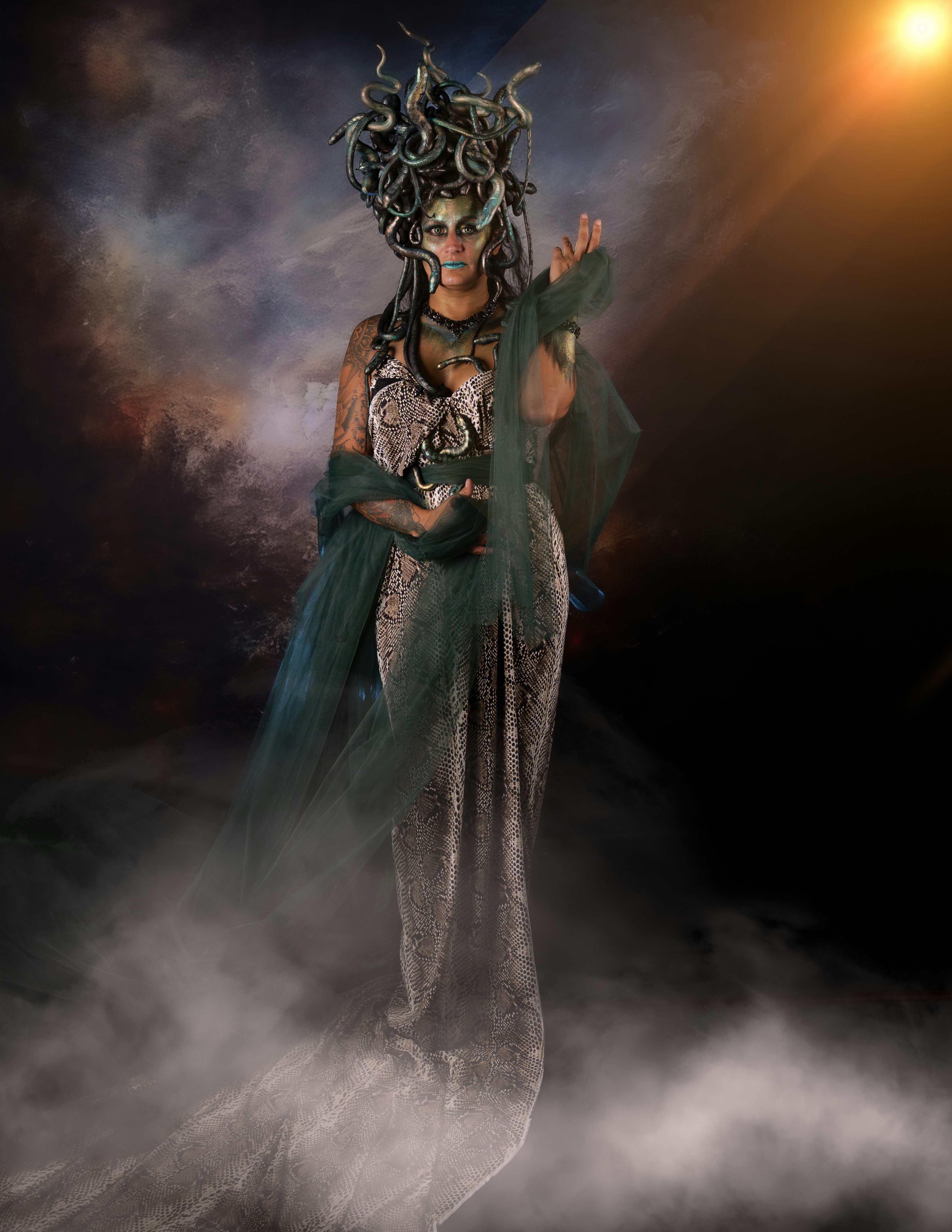 Woman dressed as medusa with snakes in hair