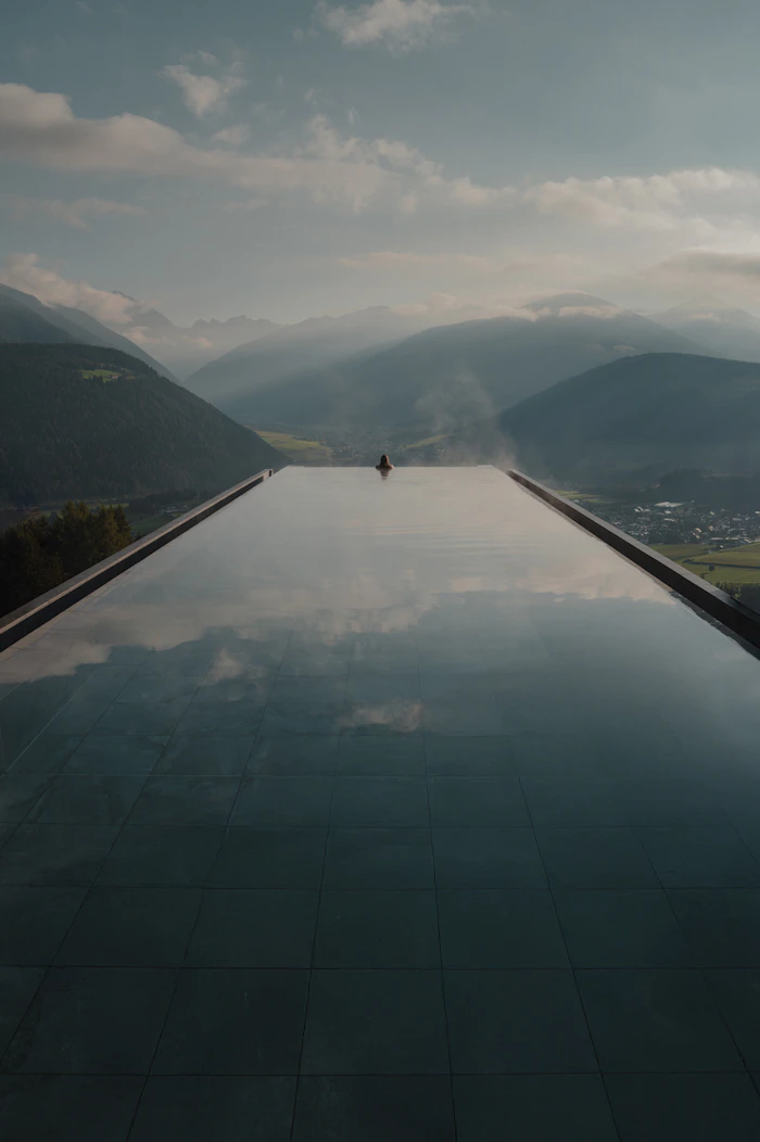 Spa retreat overlooking misty mountains