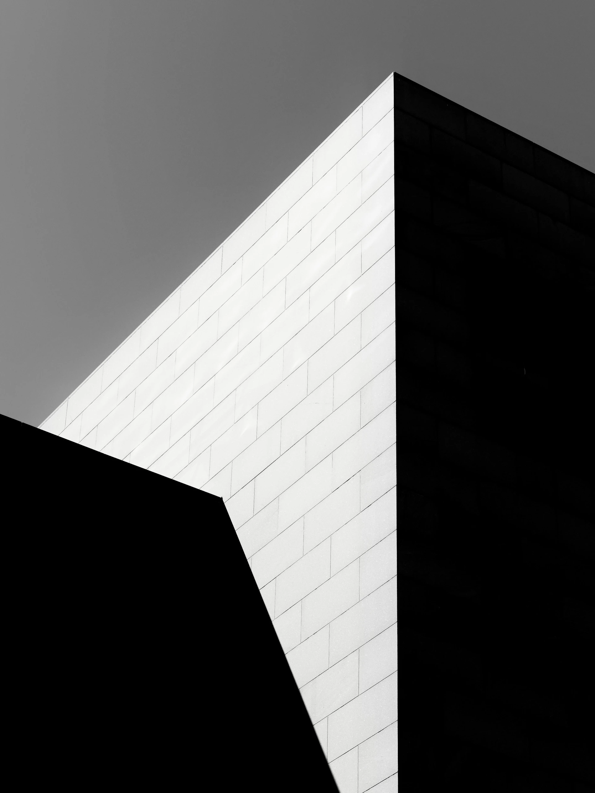Geometric architectural shapes in stark black and white contrast.