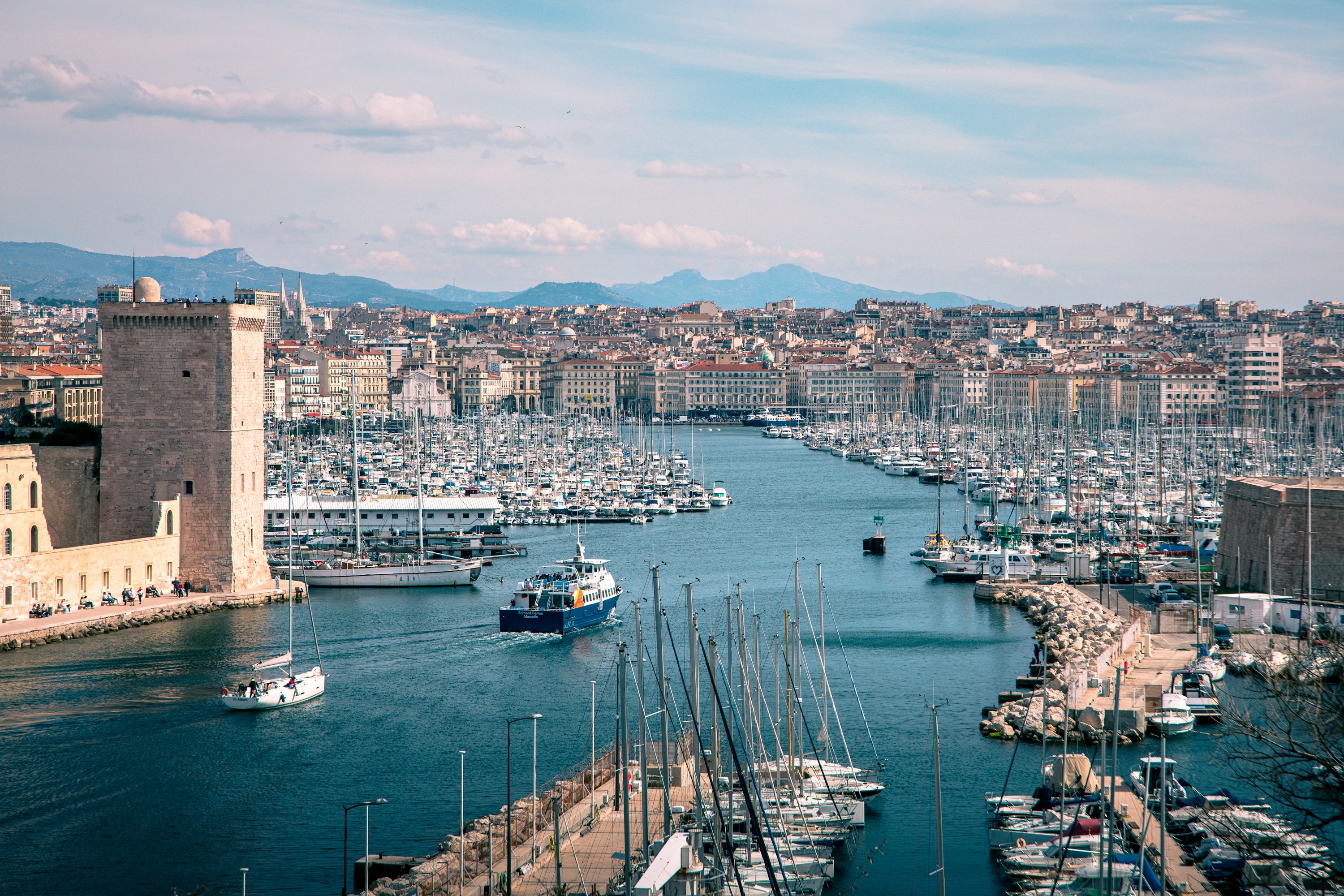 Marseille Vieux-Port with modern skyline demonstrating urban metabolism