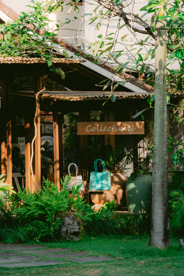 Gift totes and greenery by the entrance