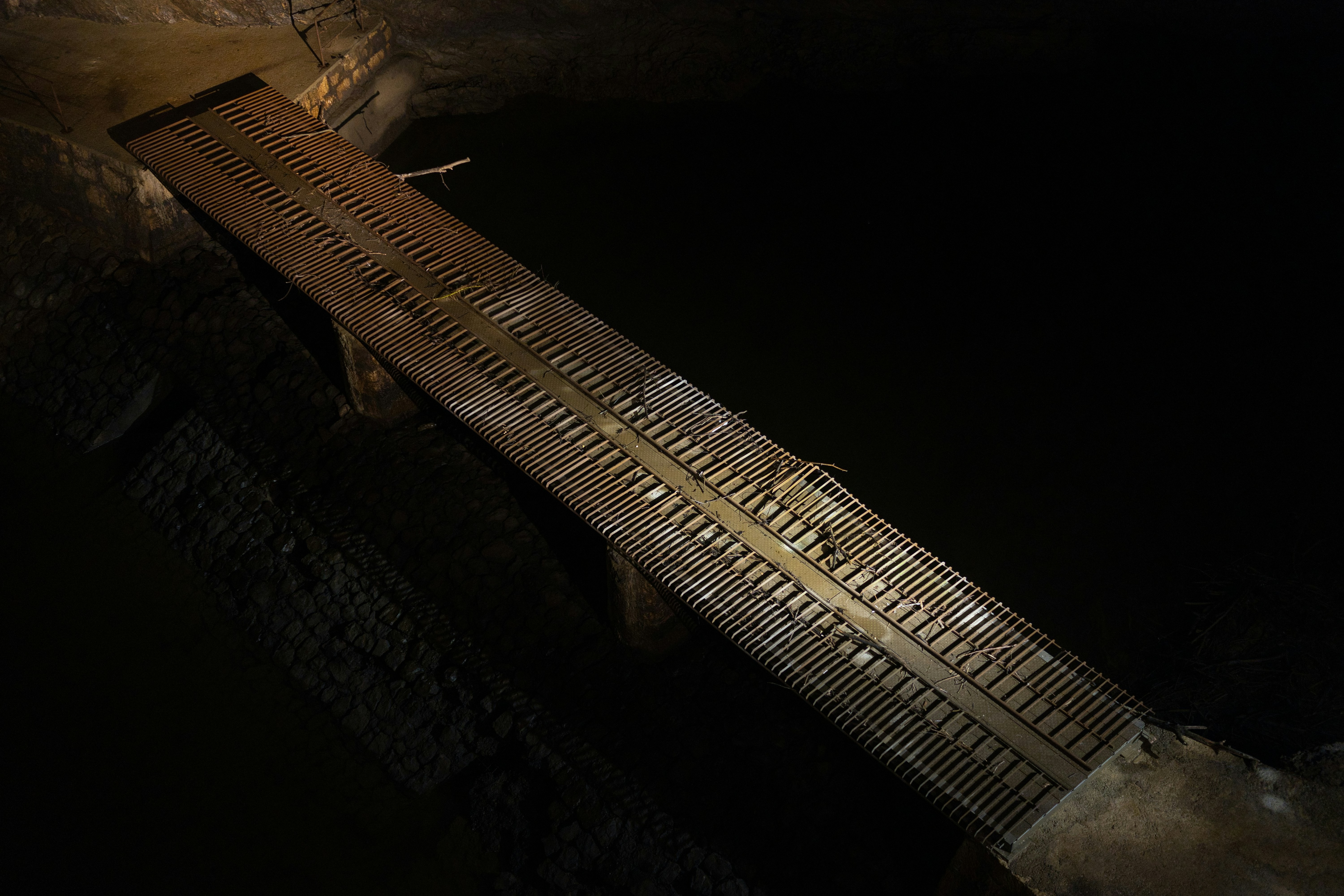 A sturdy tape measure extended across a wooden surface