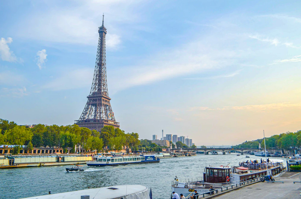 The Eiffel Tower above the Seine River in Paris, France