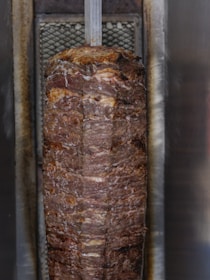 Vertical spit of rotating meat for shawarma
