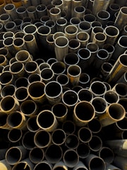Pile of metal pipes viewed from above