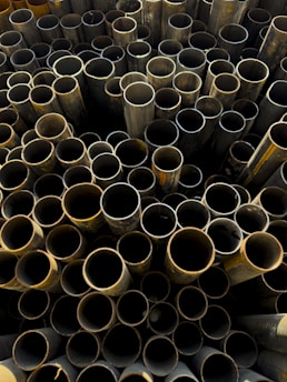 Pile of metal pipes viewed from above