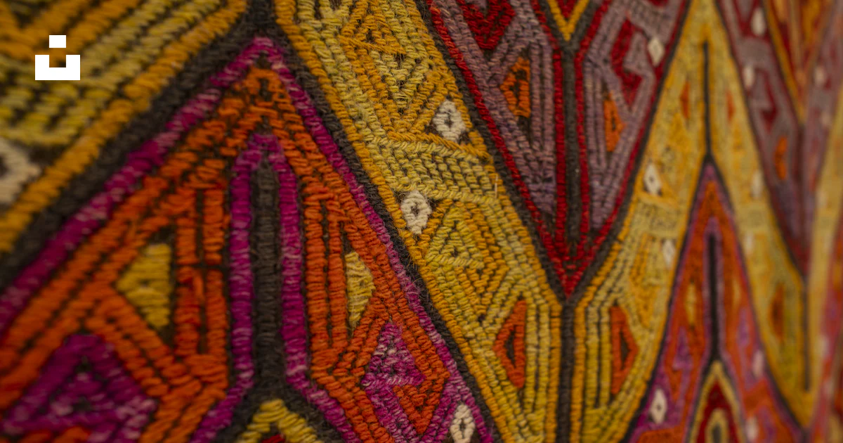 Shape Examples Textiles Close-up of a colorful woven textile with geometric patterns. photo ...
