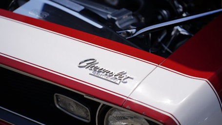 Classic chevrolet car with red and white stripes
