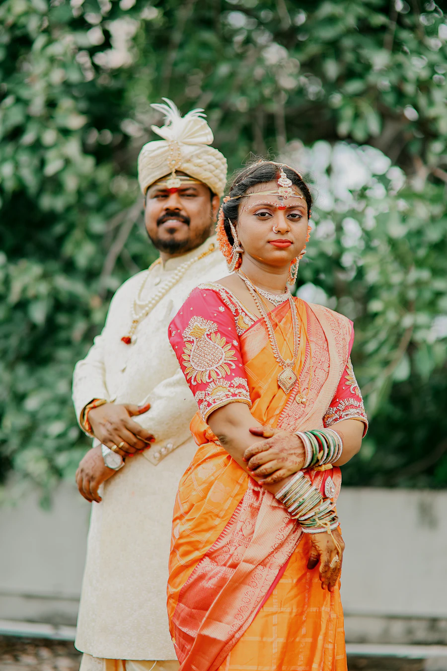 Couple in traditional Indian wedding attire