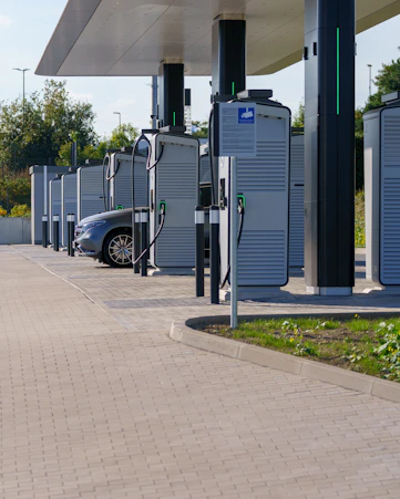 Electric car charging stations in a row