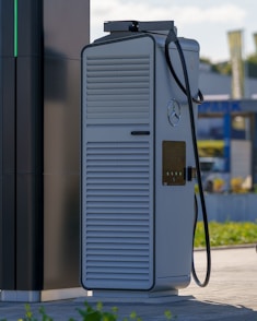 Modern electric vehicle charging station on a sunny day.