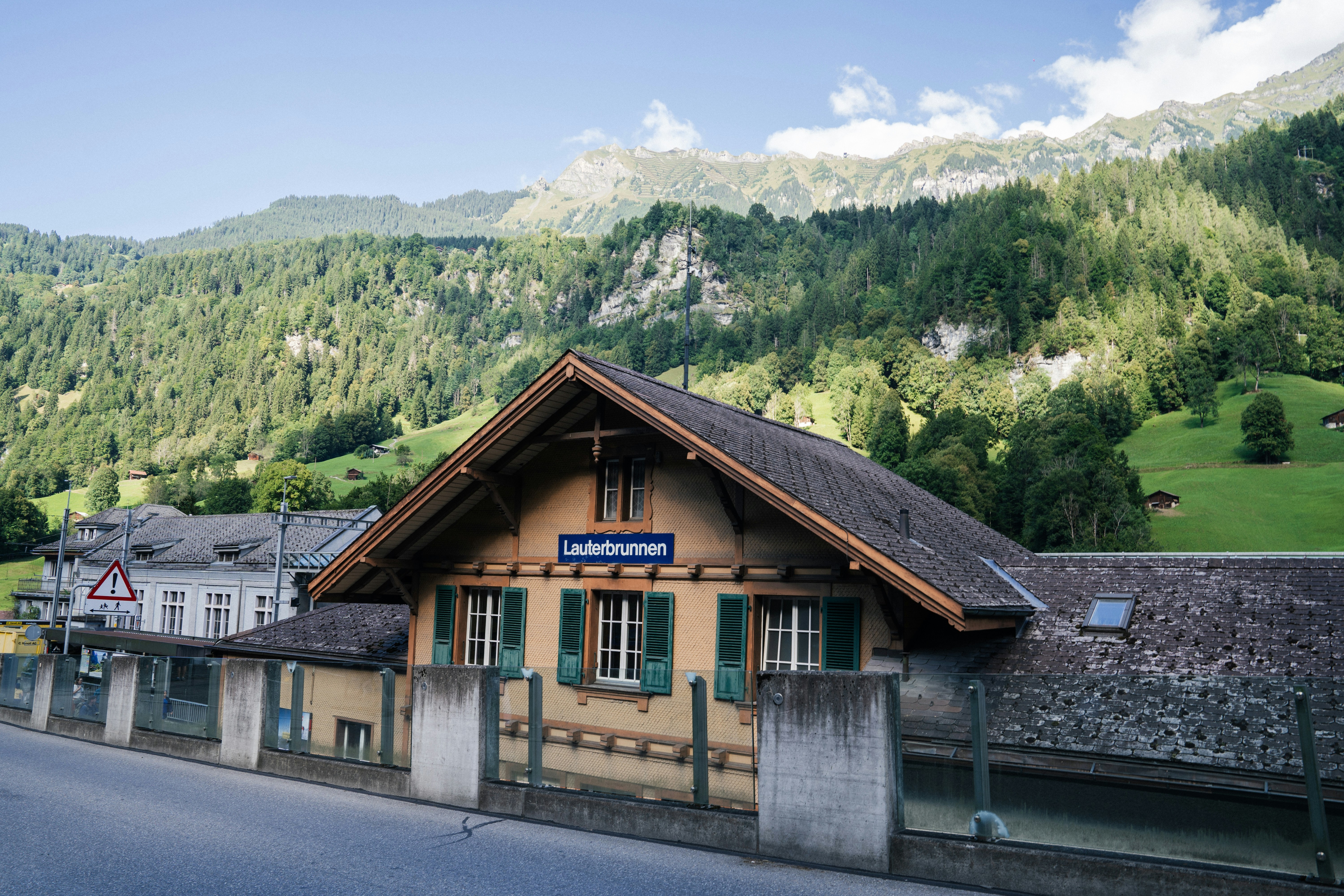 Wooden building in a green mountain valley