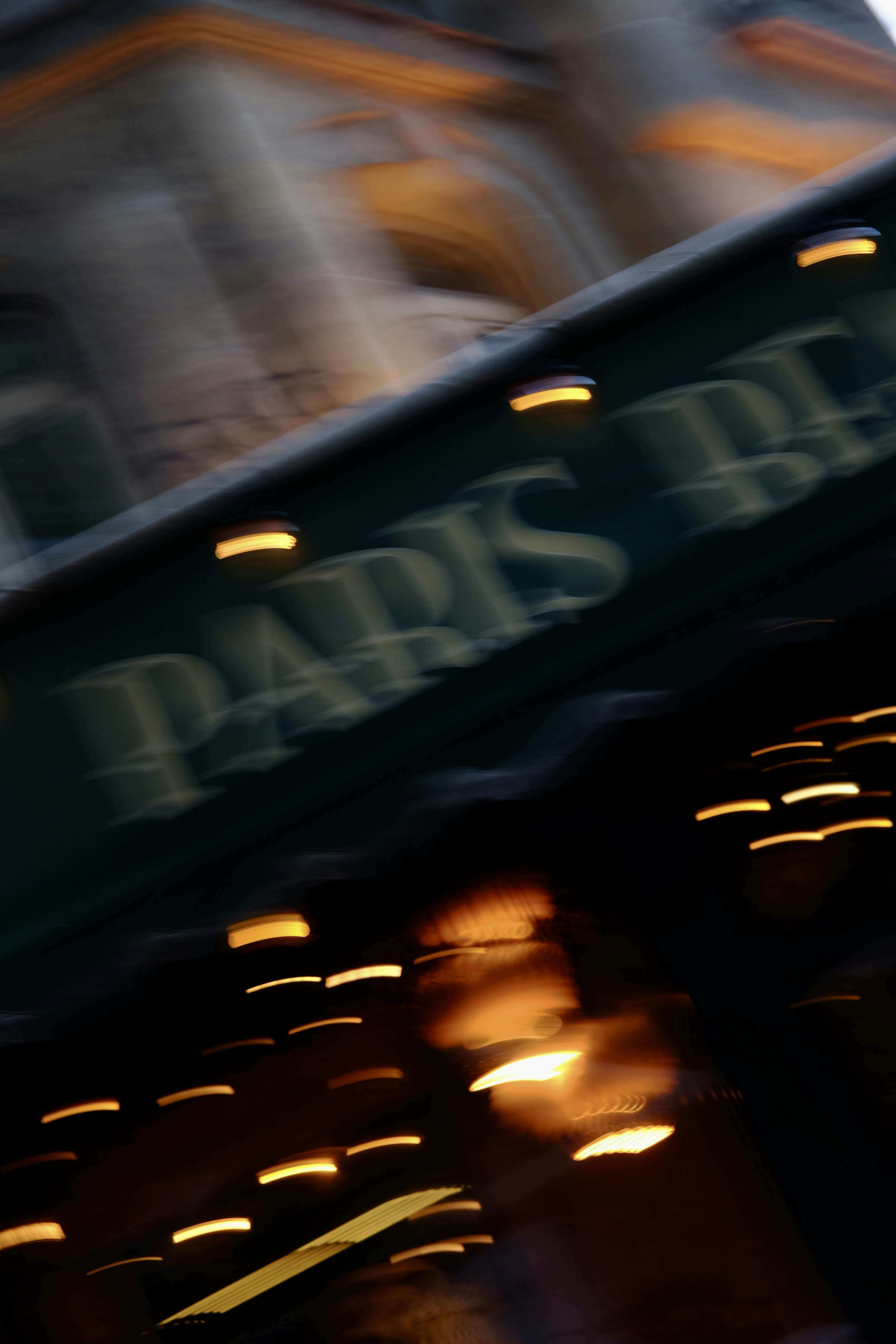 Blurry lights and building at night