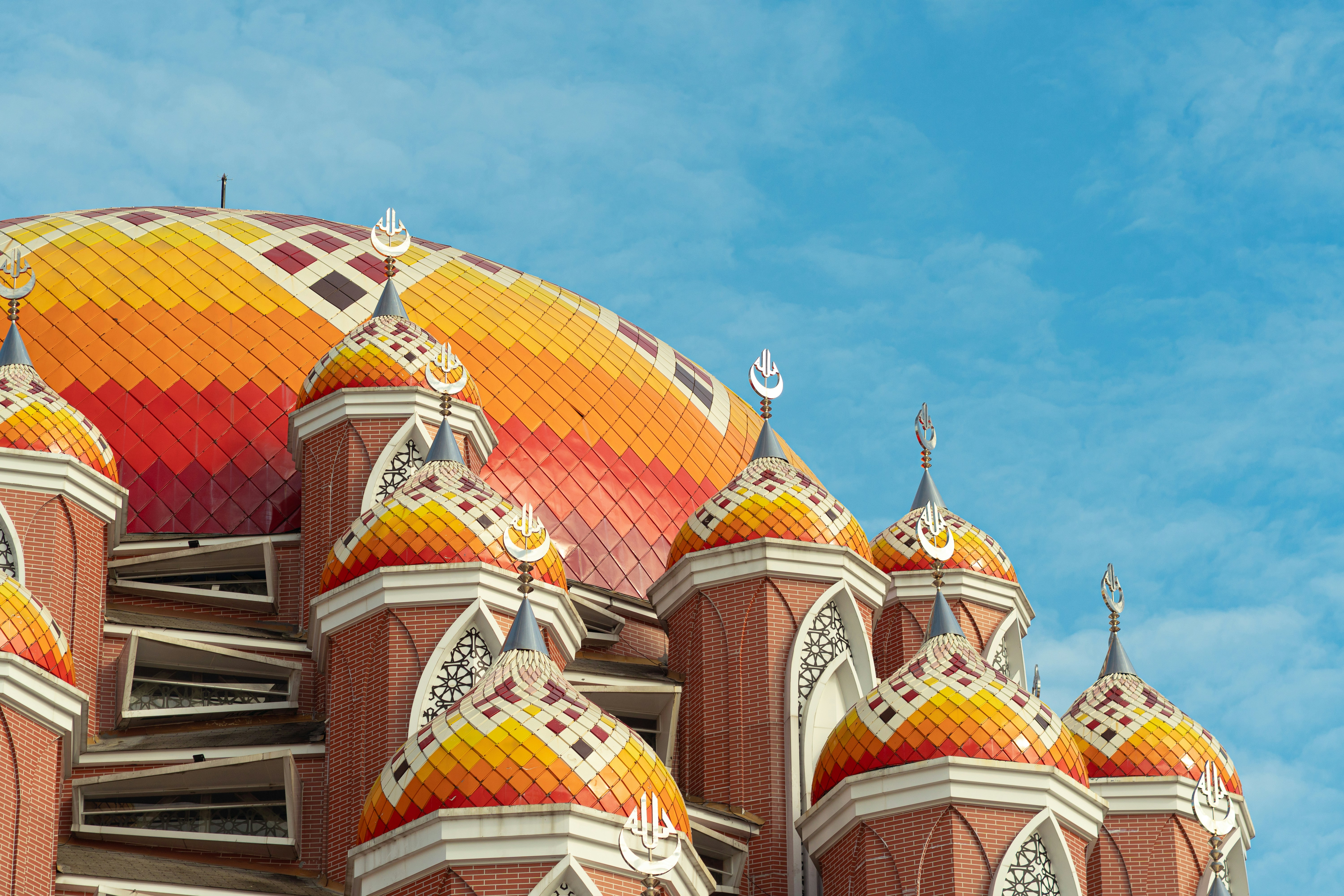 Colorful domed building against a blue sky
