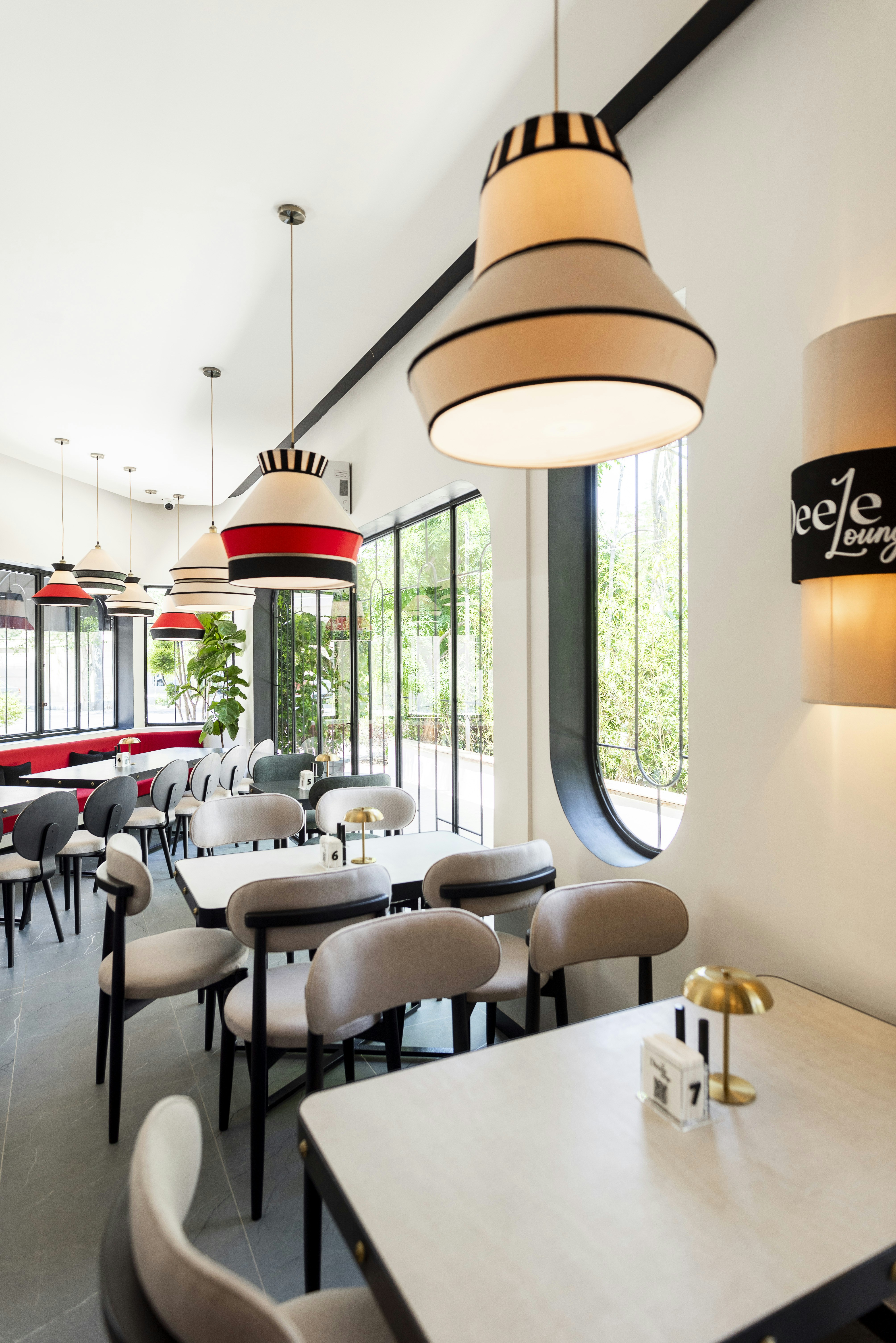 Modern cafe interior with tables and chairs