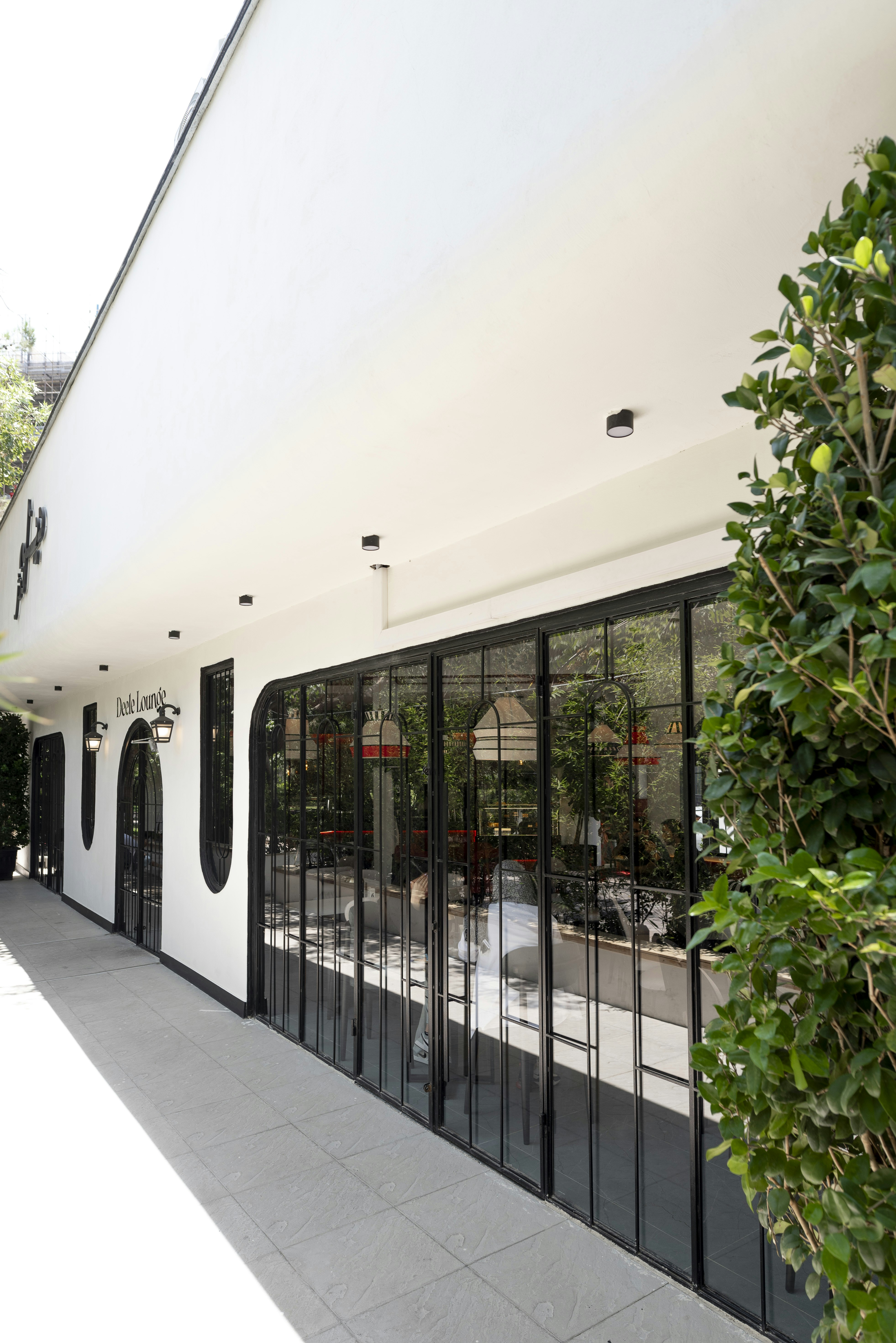 Modern white building with large glass windows