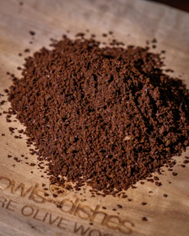 A pile of finely ground coffee beans