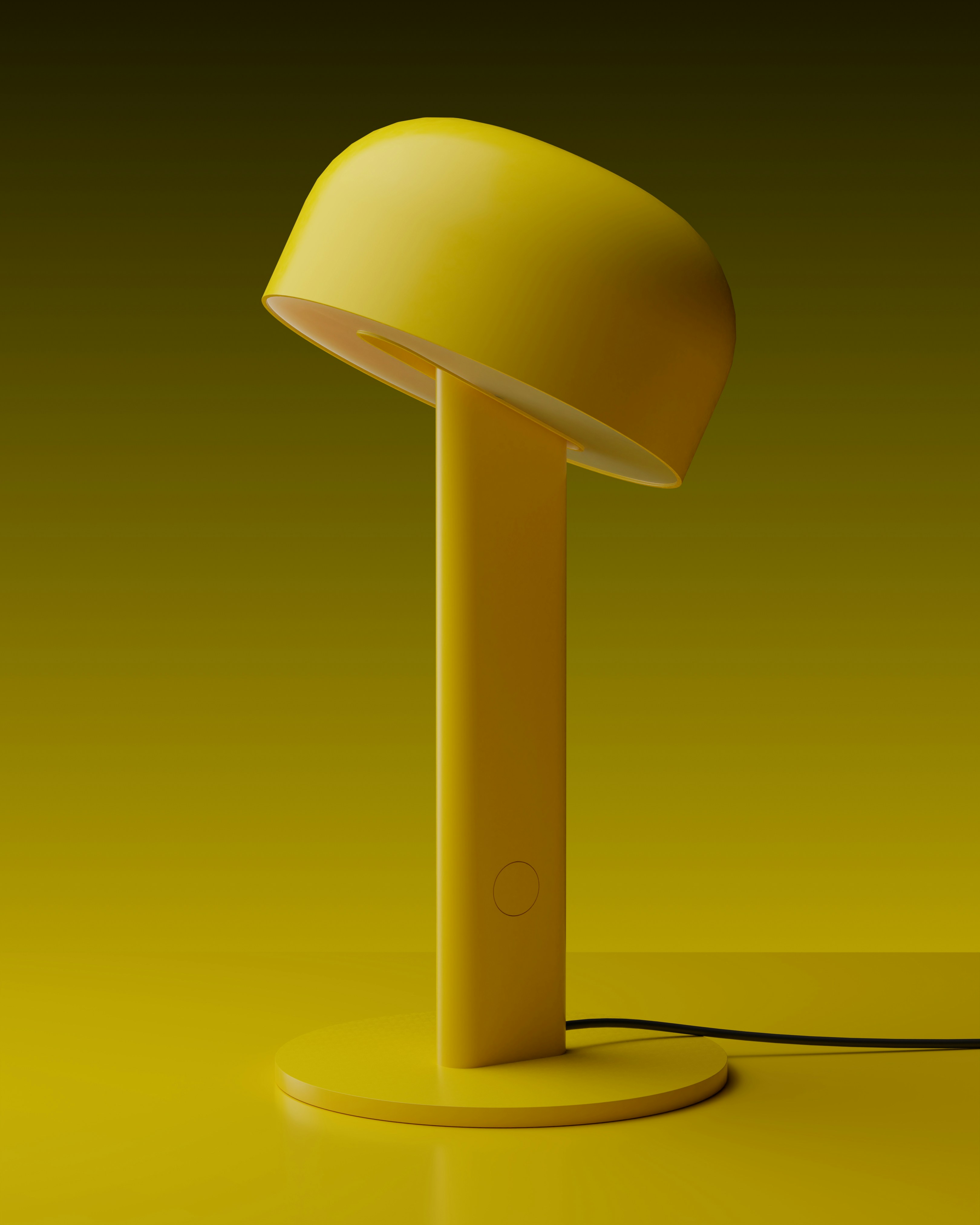 A modern yellow desk lamp on a yellow background