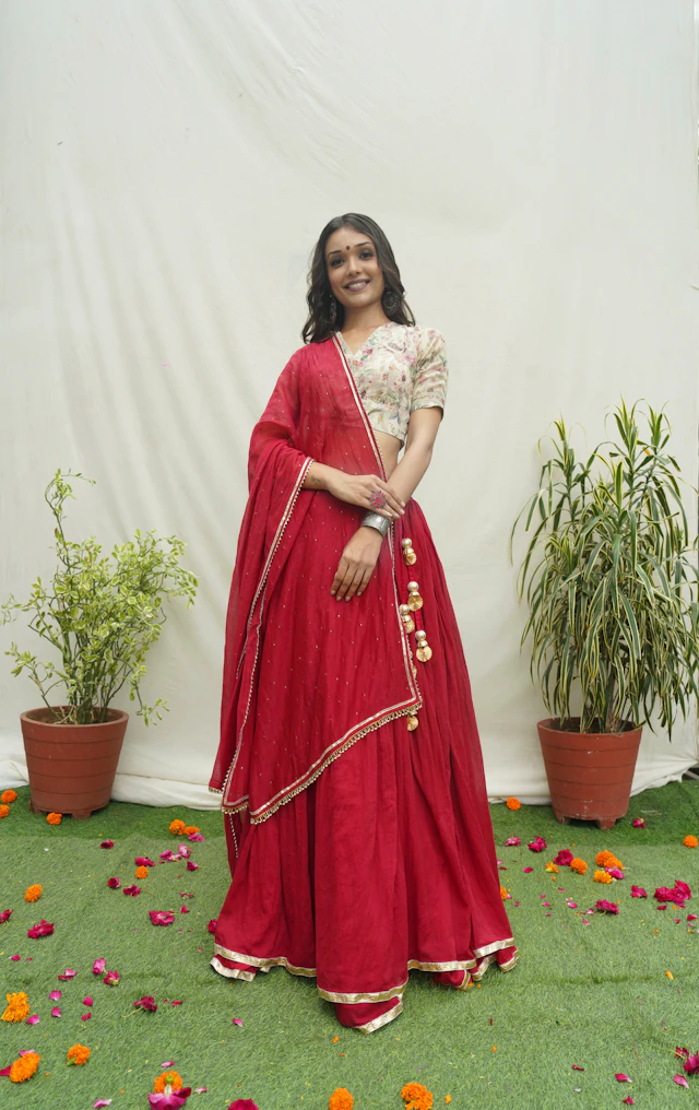Woman wearing a crimson lehenga — AI virtual try-on preview
