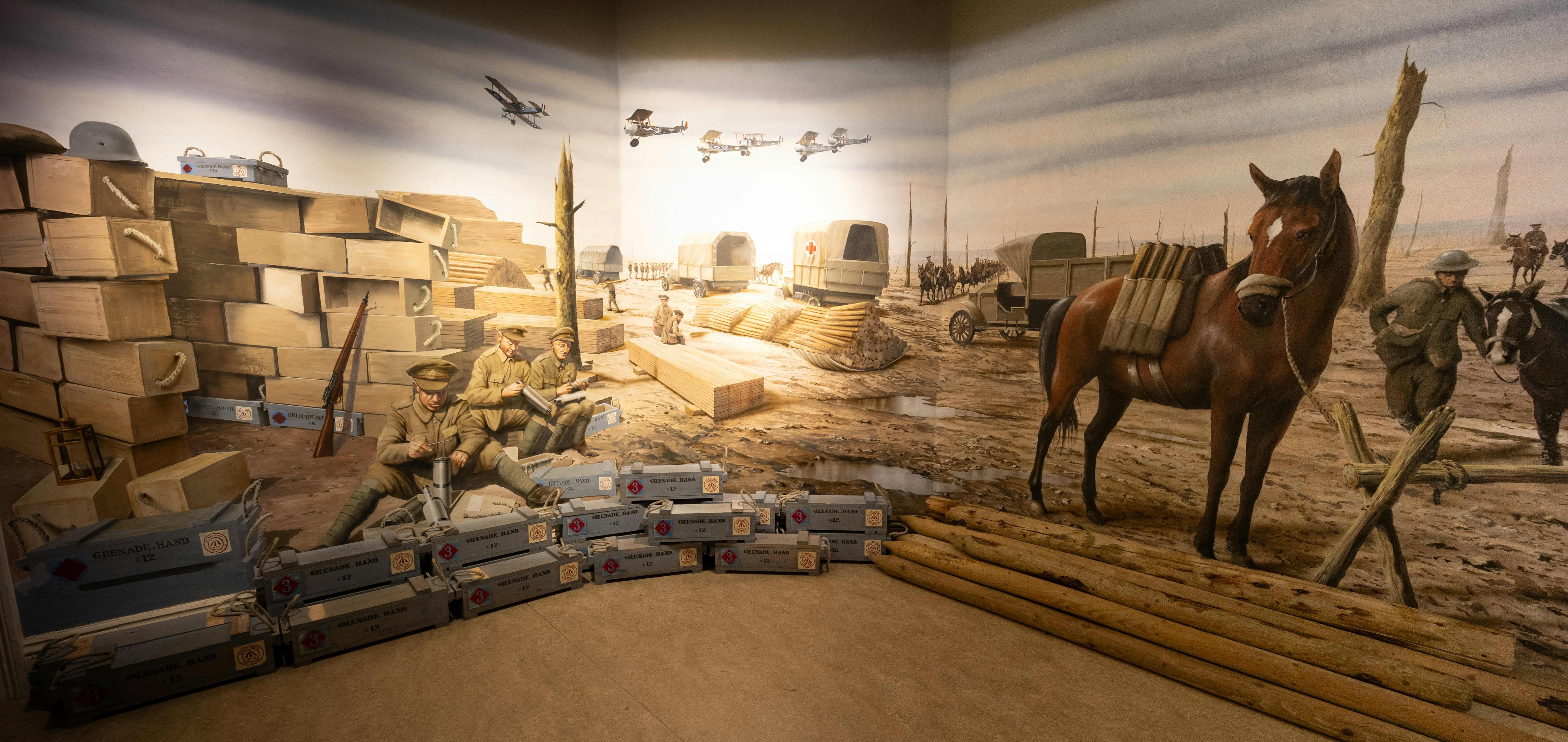 Wwi diorama with soldiers, horse, and airplanes