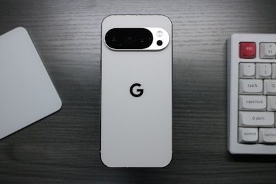 White smartphone with google logo and camera array.