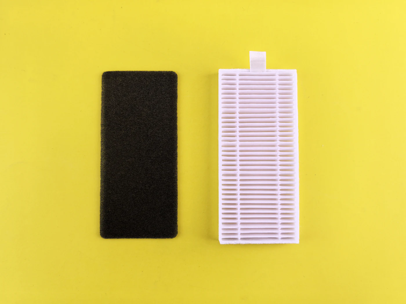 Stacked pleated air filters in a warehouse