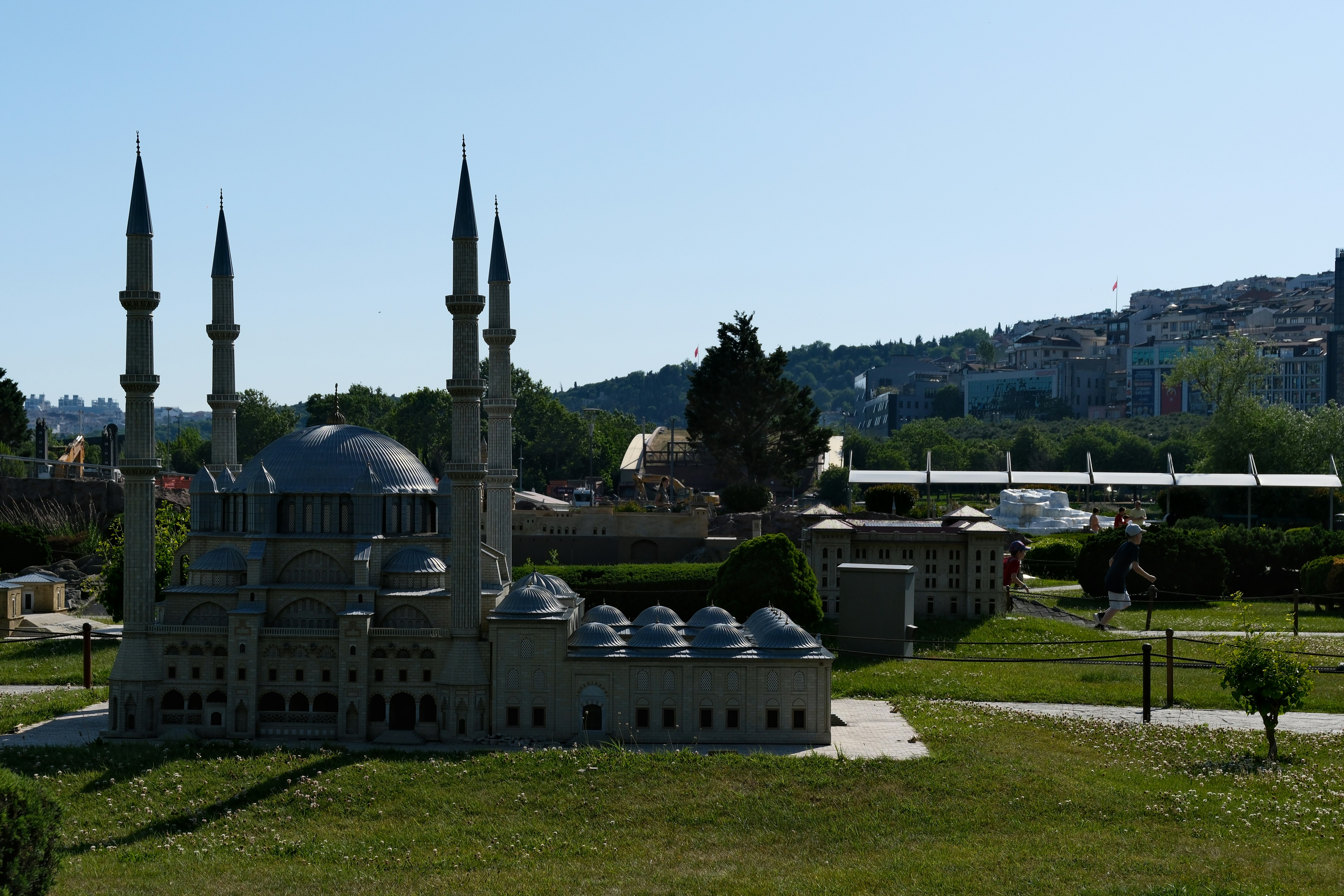 Miniature mosque with minarets and domes in park