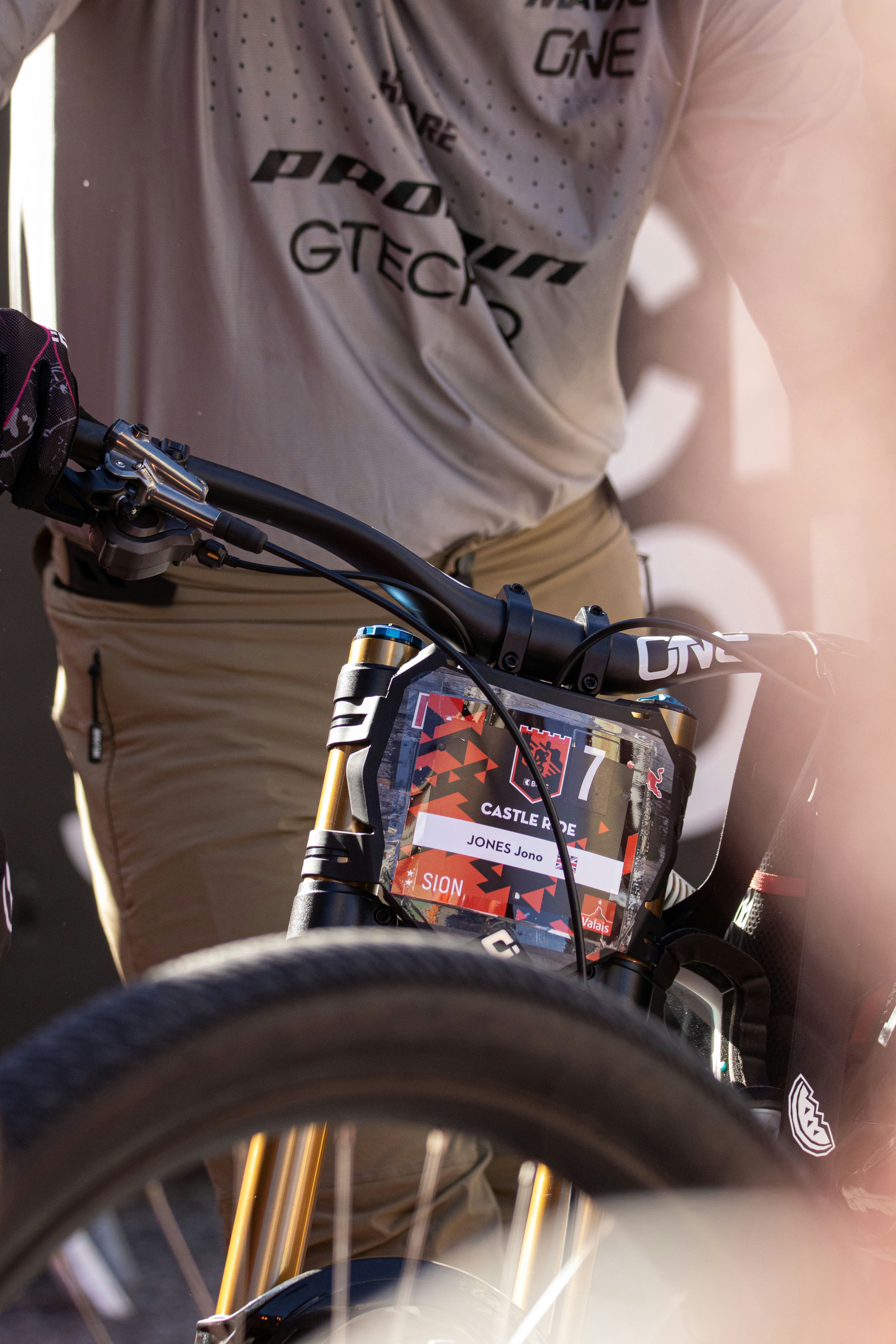 Mountain biker with number seven on handlebars