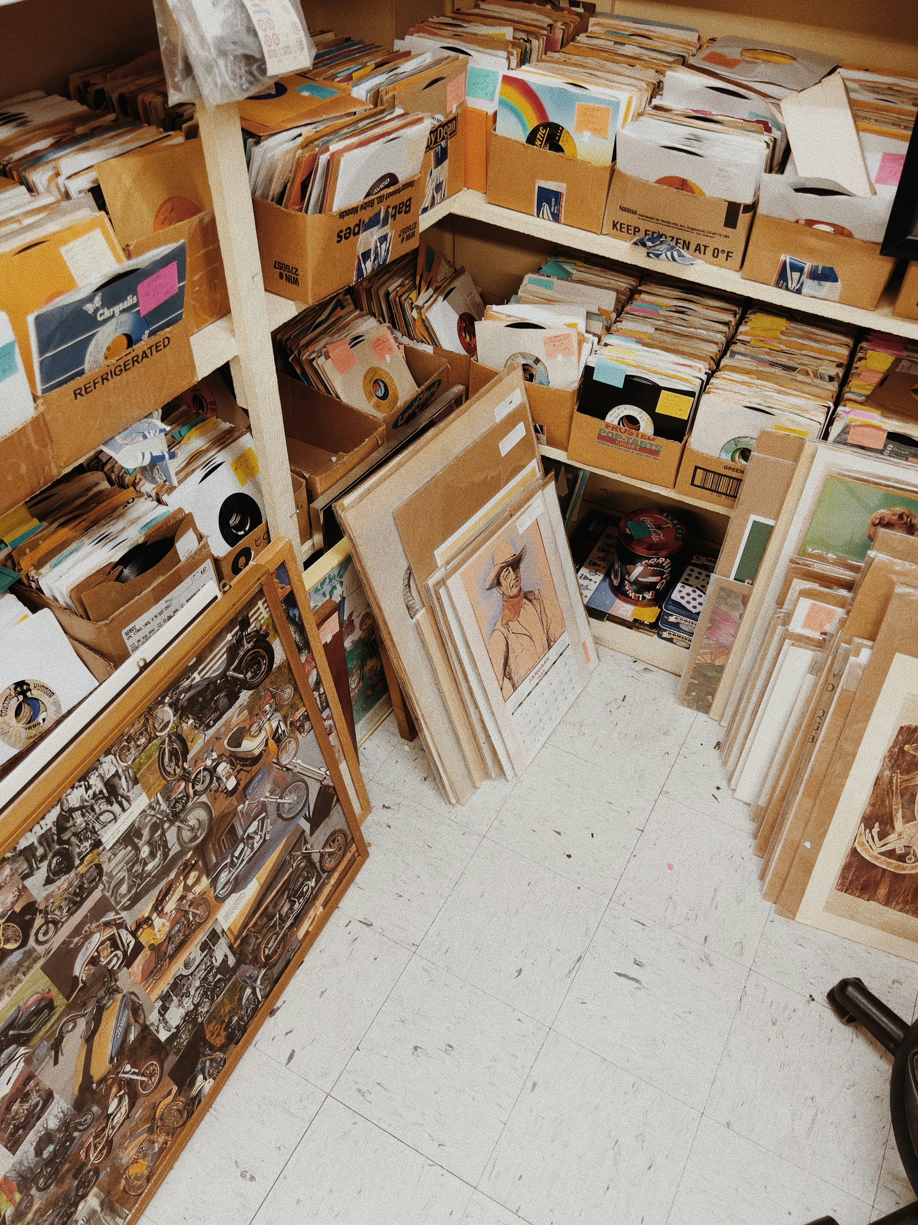 A room filled with records, art, and miscellaneous items.