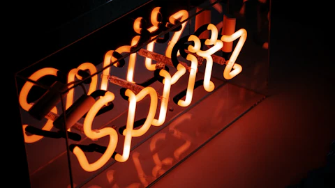 Orange neon sign spelling out "spritz"