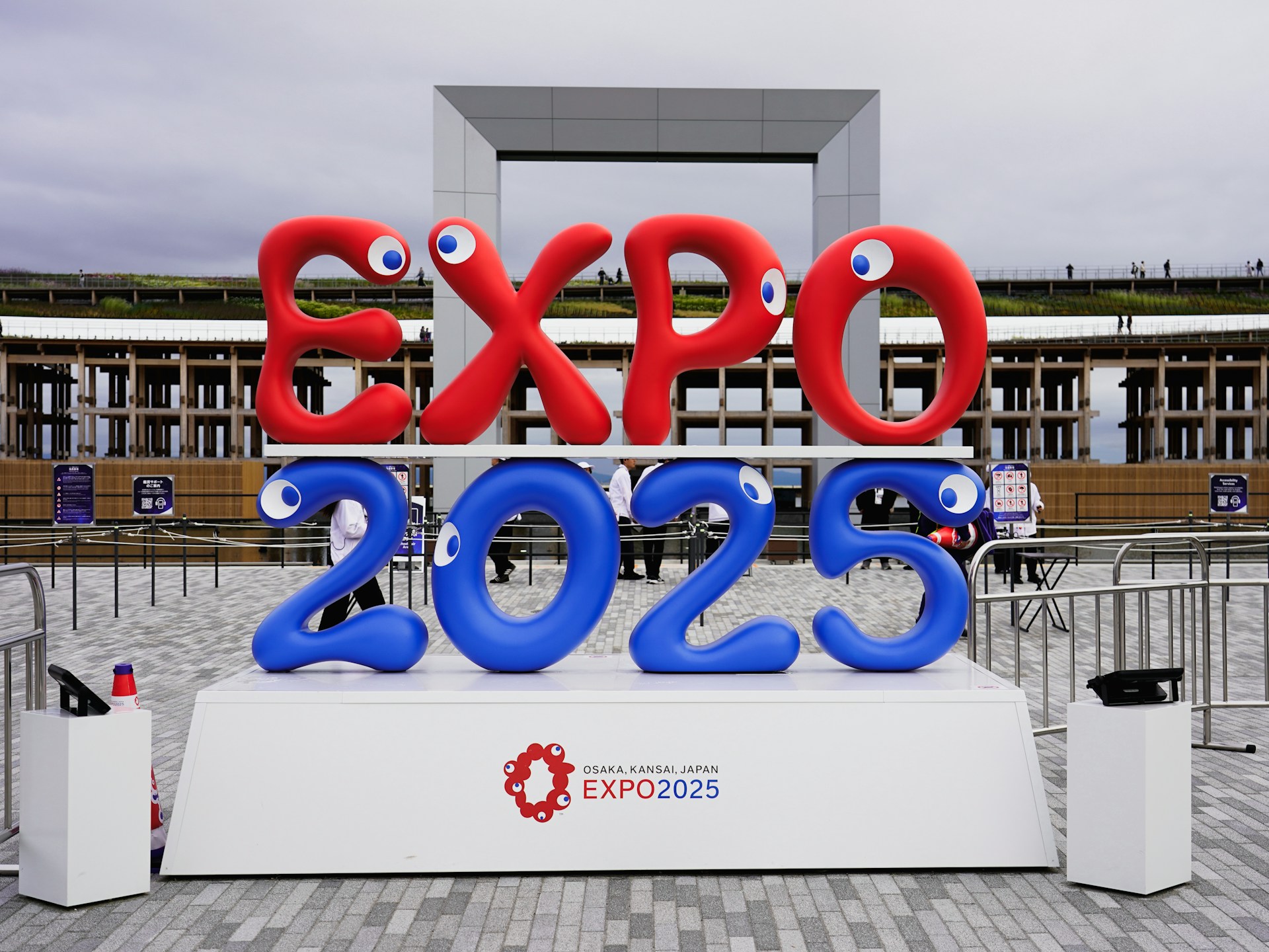 Expo 2025 sign with playful eyes