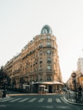 Corner building with dome on a sunny day.