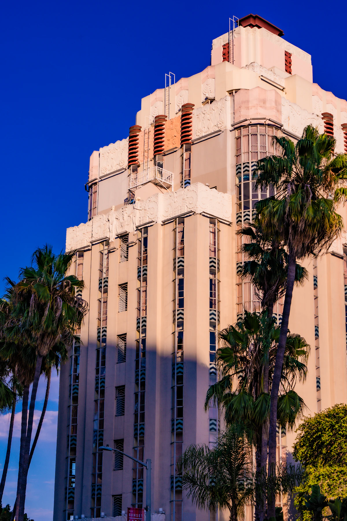 Art deco building and palms on the Sunset Strip in West Hollywood
