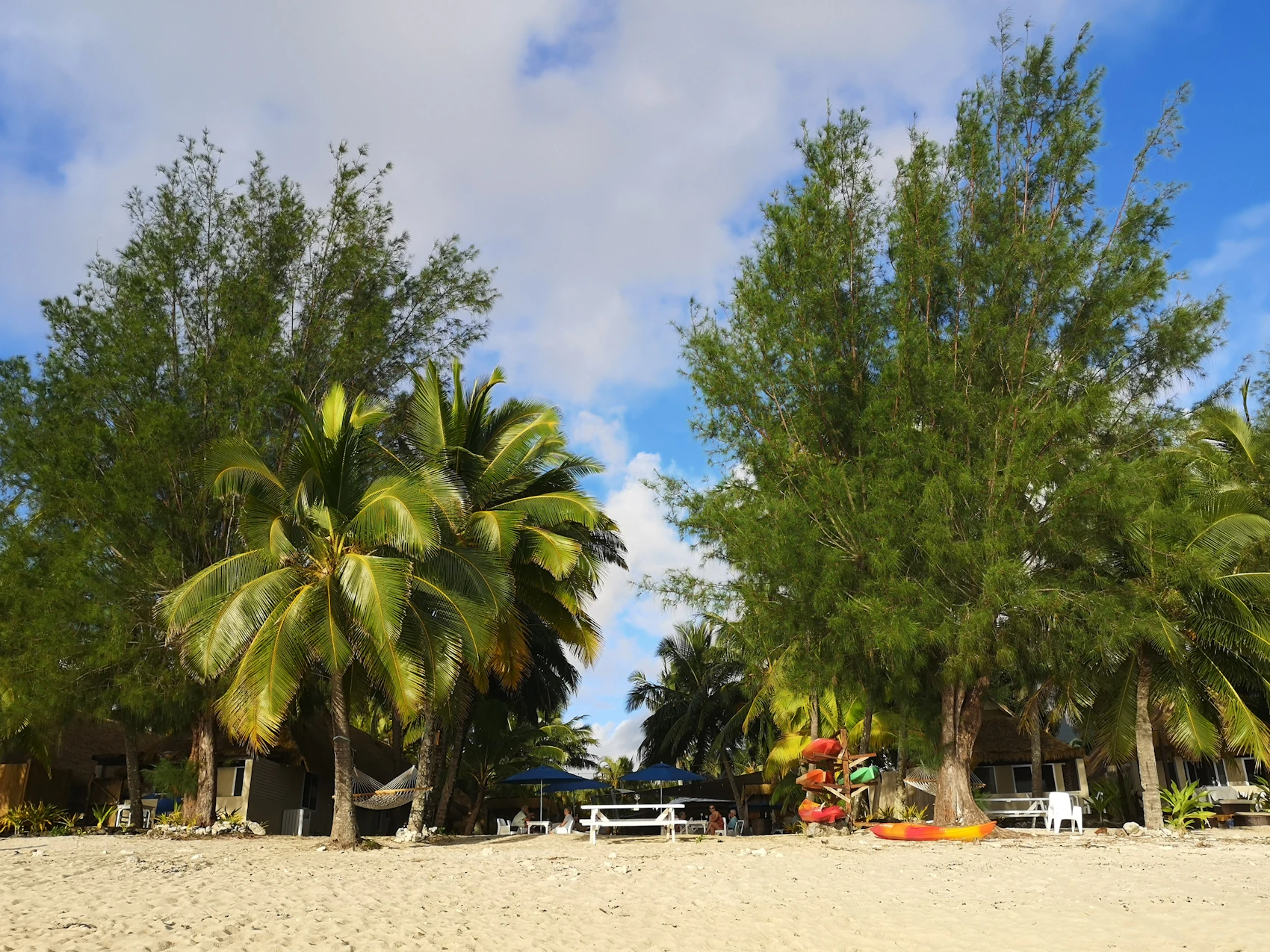 Palm trees, kayaks and a turquoise lagoon on Rarotonga in the Cook Islands