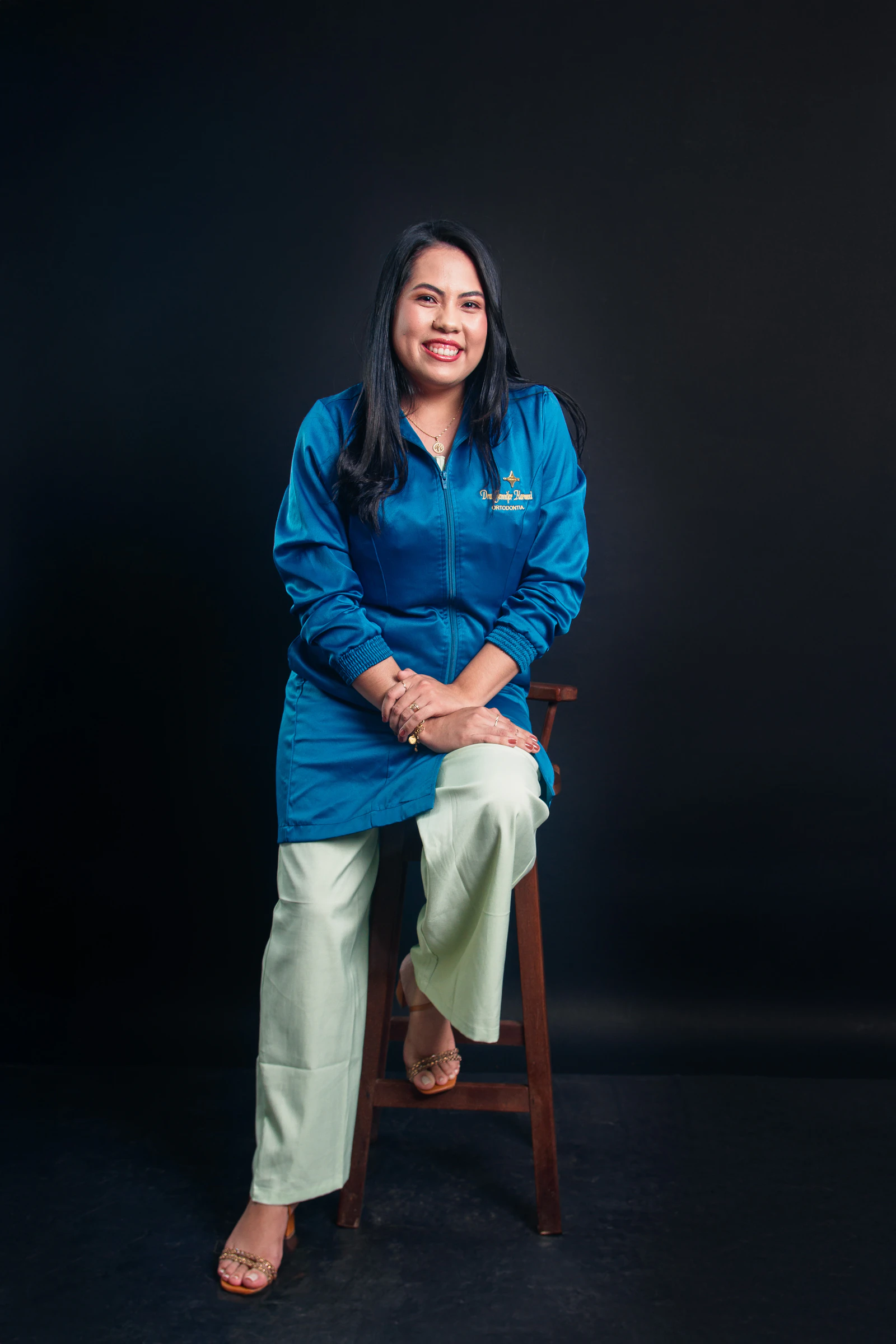 Spa therapist in a professional wellness tunic uniform