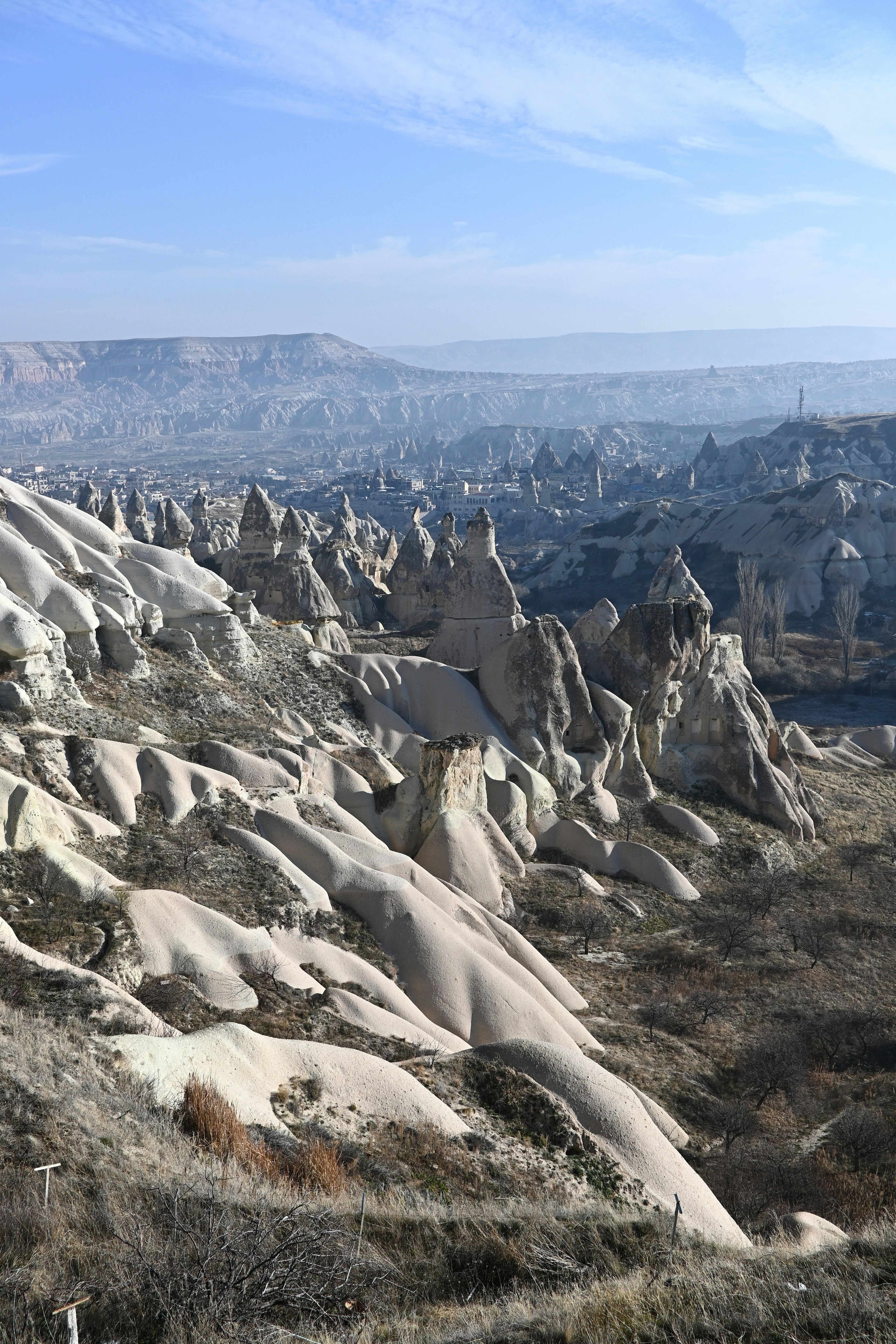 Unique rock formations in a vast, arid landscape
