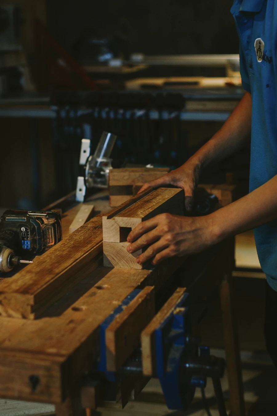 Carpenter working with wood in a workshop