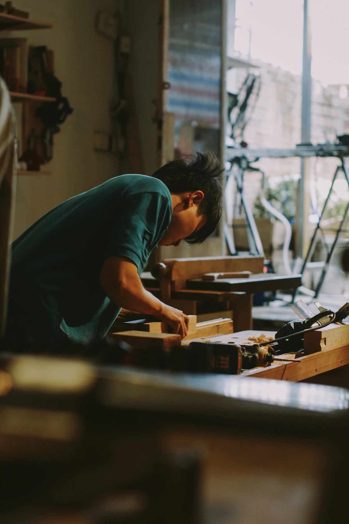 Carpenter working on wood in a workshop