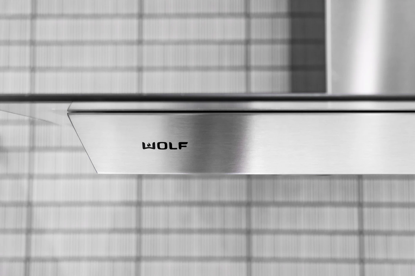 Stainless-steel range hood representing chimney service