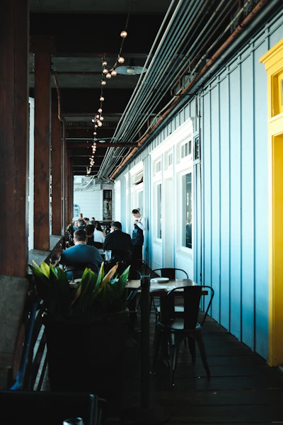 People enjoying outdoor patio dining at a Bay Area restaurant