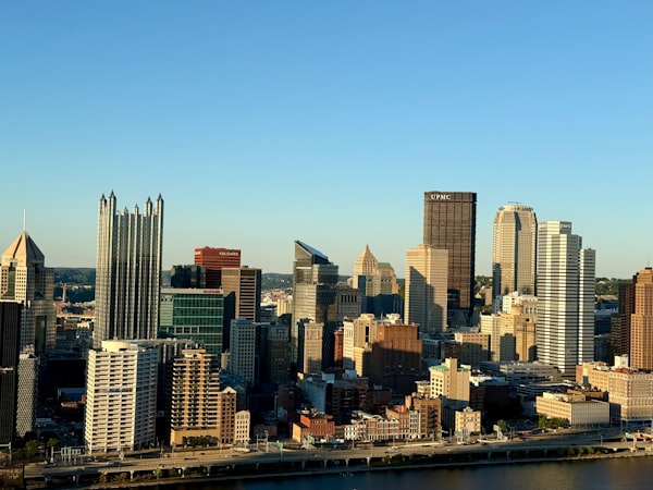 Pittsburgh skyline with downtown skyscrapers along the river, home to the region's dense network of nonprofit funders