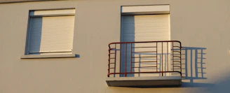 Building exterior with a window and balcony