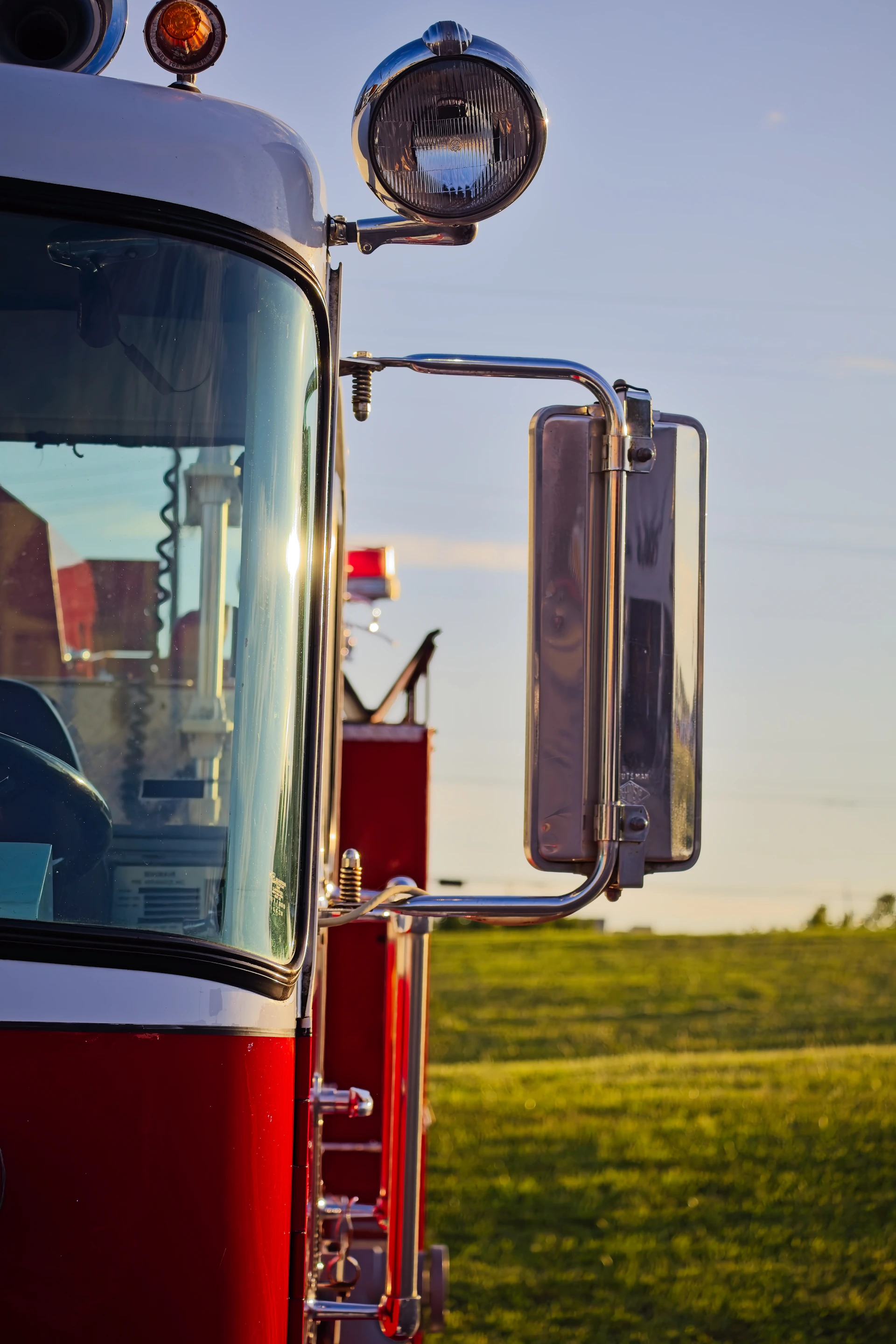 Close-up of a fire truck exterior with chrome details.